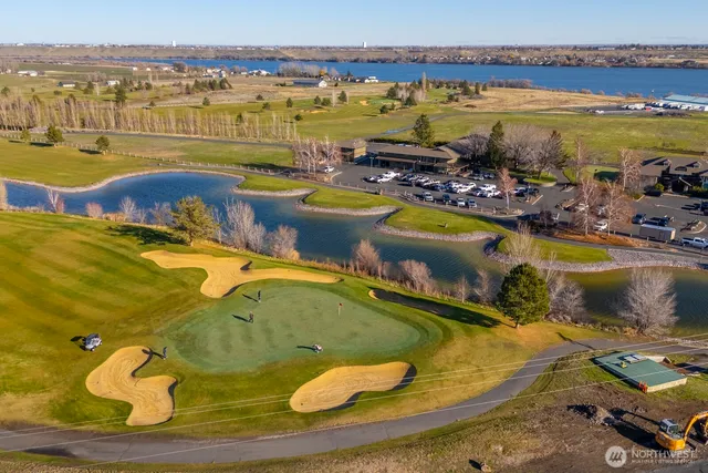 a view of a swimming pool with an ocean view
