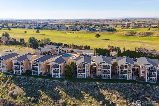 a view of a city with lawn chairs
