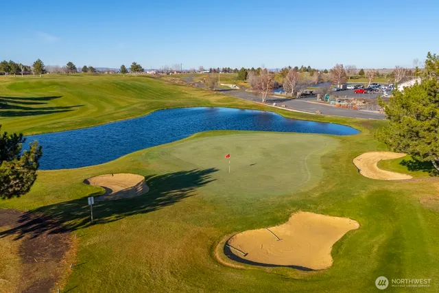 a view of an ocean pool and yard