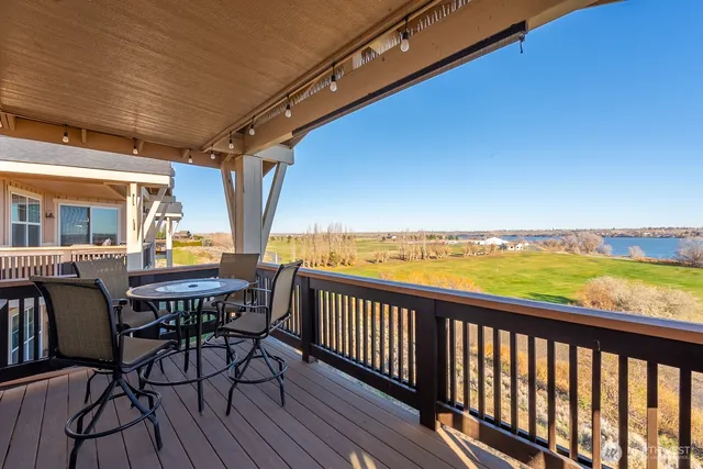 a view of a chairs and table on the terrace