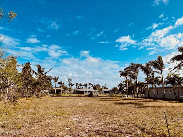 a view of a town with mountains