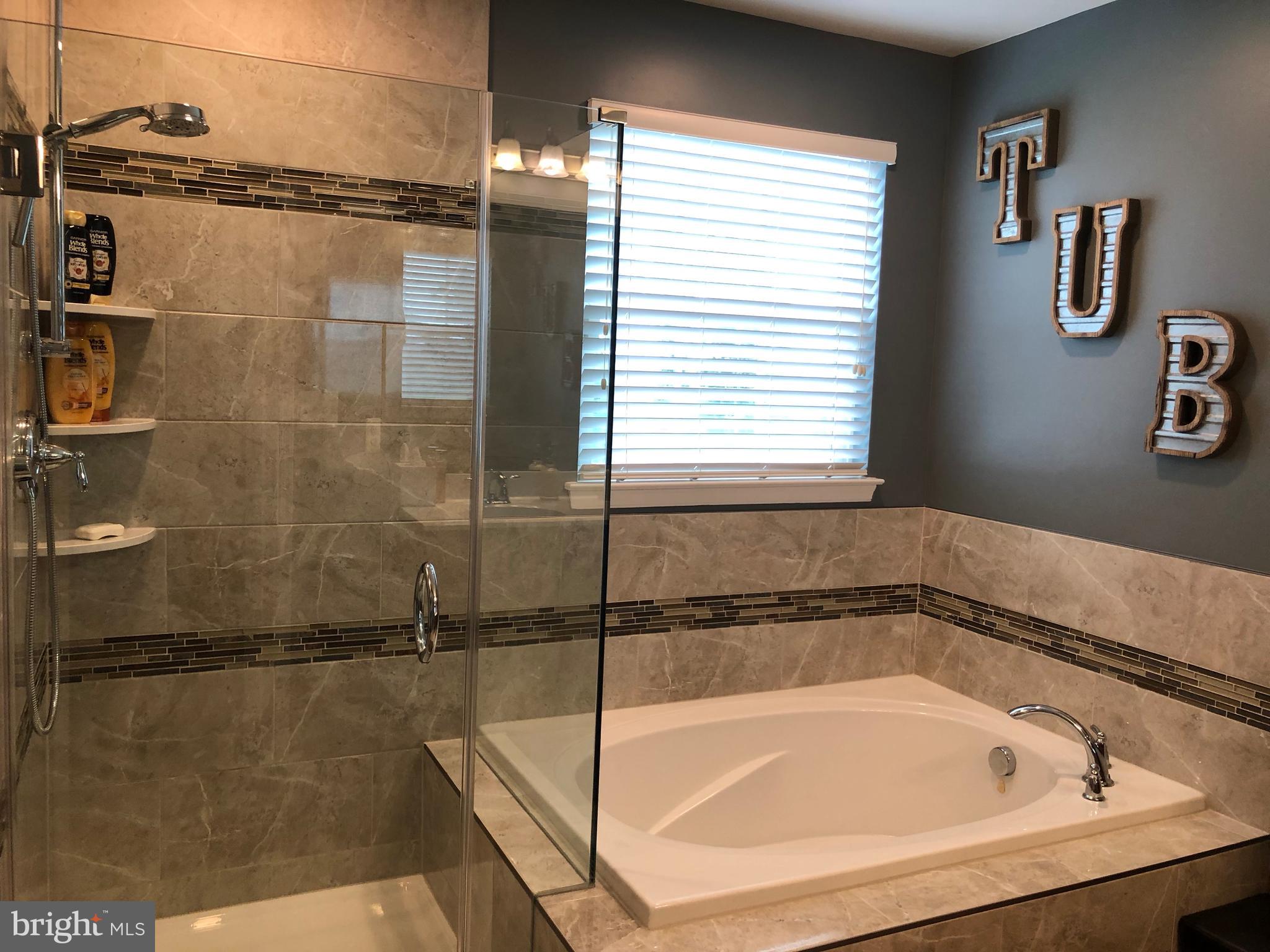 146 Short Branch Road Stafford, VA 22556 - Photo 5 of 59 Renovated bath in 2018 with stunning tile