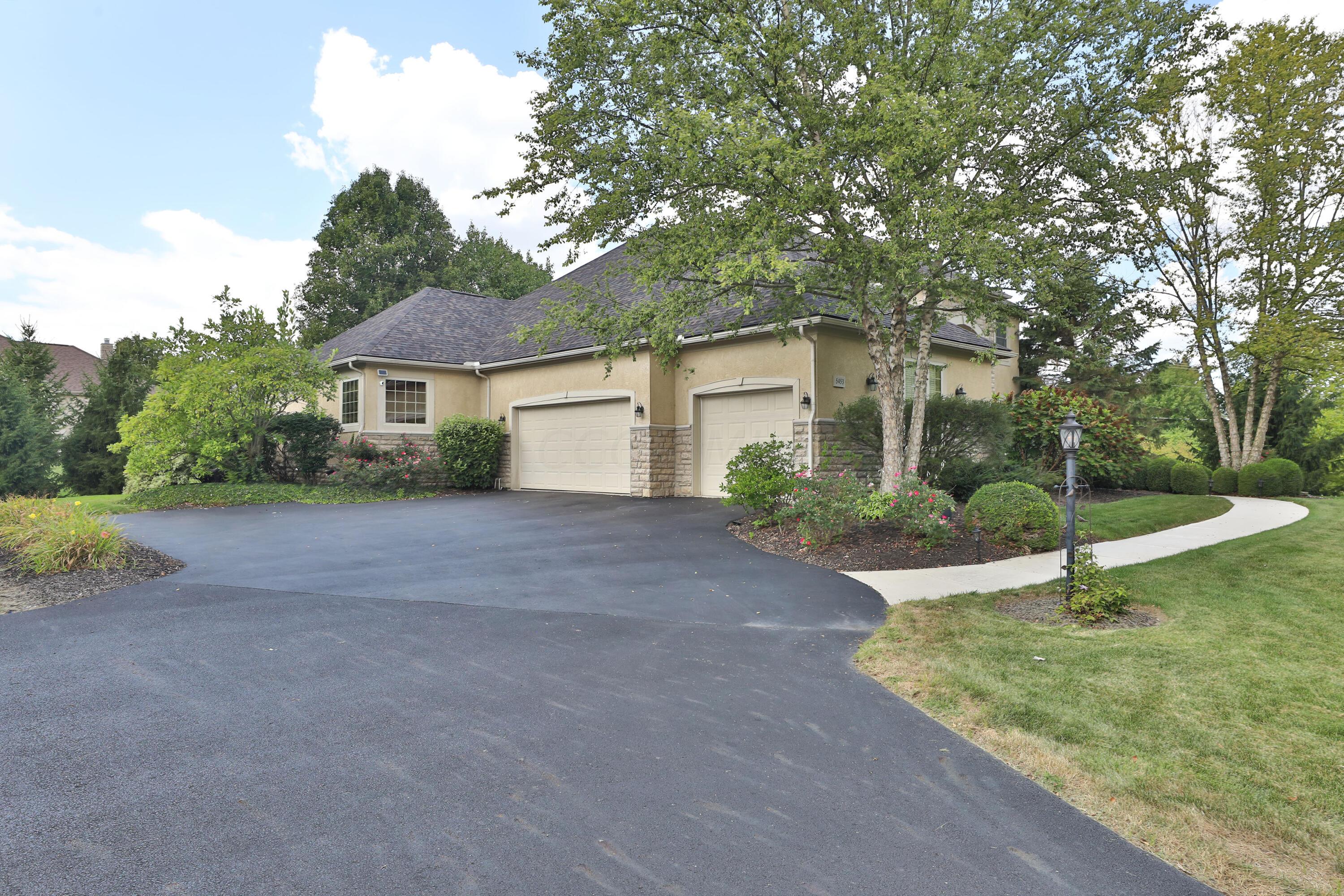 5453 Dublin Road Dublin, OH 43016 - Photo 31 of 38 Newer asphalt drive with a 3 car garage, new garage door springs.