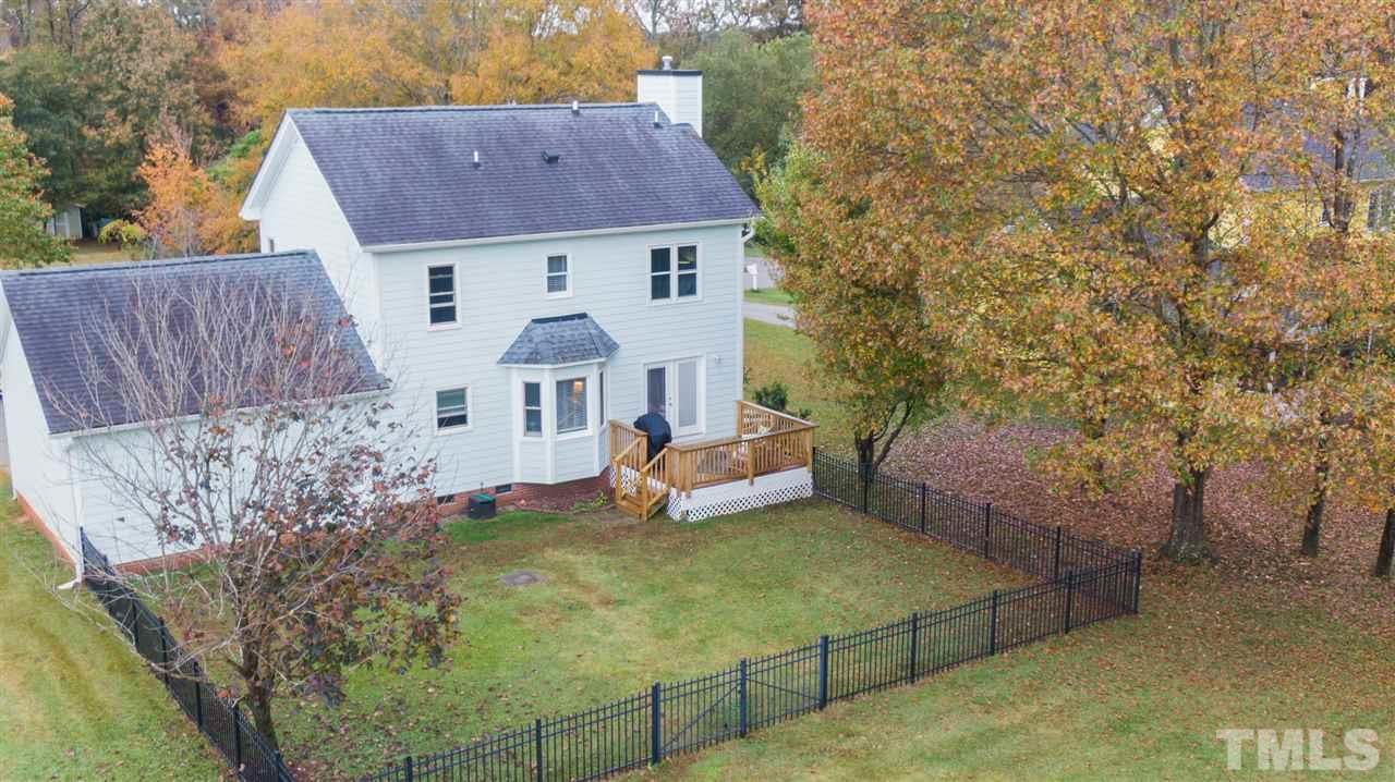2016 Stonepond Lane Raleigh, NC 27603 - Photo 20 of 23 Fully fenced in yard with a double gate for ride on mower access.