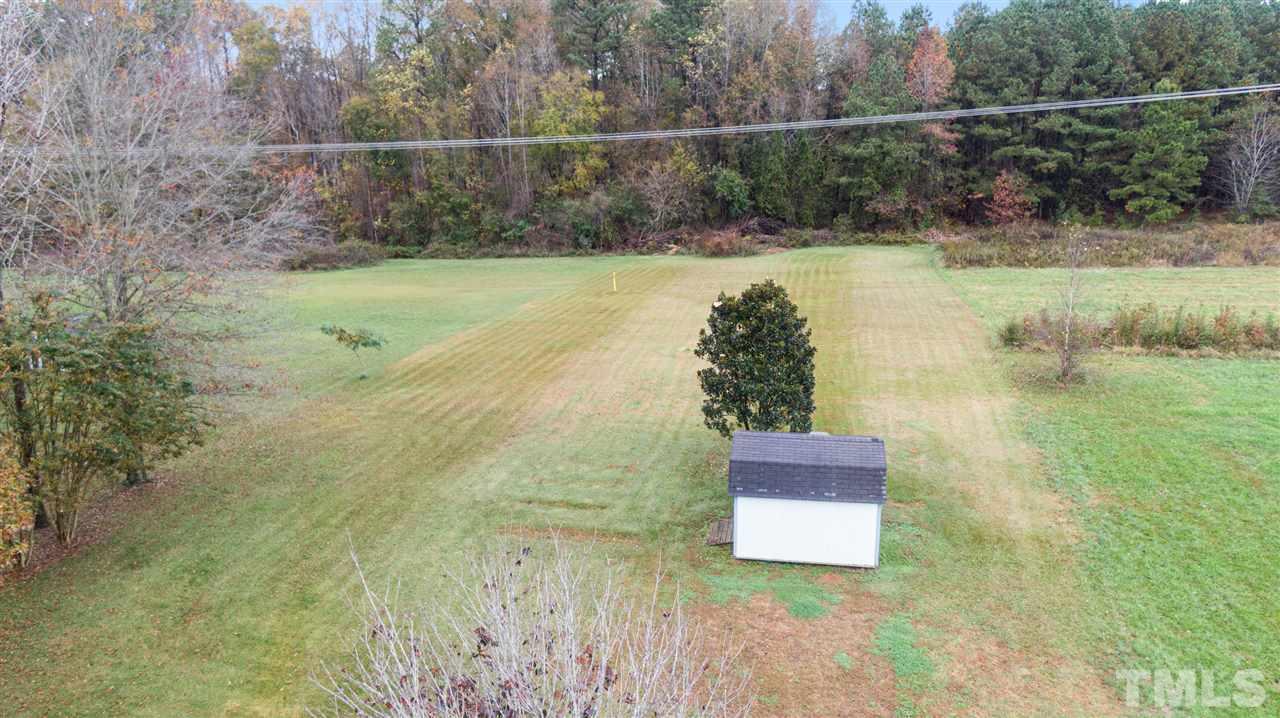 2016 Stonepond Lane Raleigh, NC 27603 - Photo 22 of 23 This yard extends approximately 25' into the wooded treeline. The 8x12 shed is great for storing yard equipment or anything you do not want to store in your two car garage.
