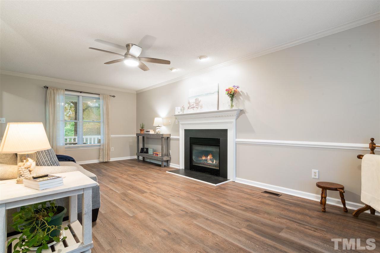 2016 Stonepond Lane Raleigh, NC 27603 - Photo 7 of 23 The front windows and the double doors that lead to the deck, flood this beautiful room with tons of natural light!