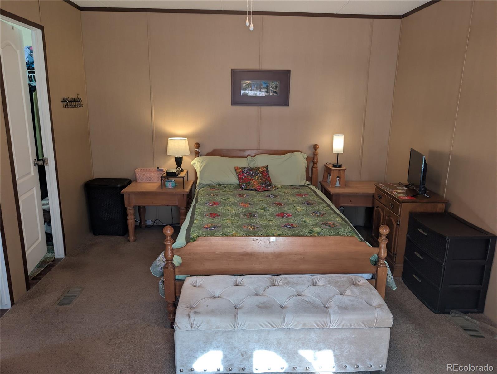 19 Danny Street Castle Rock, CO 80109 - Photo 14 of 33 a bedroom with a bed and a table in it