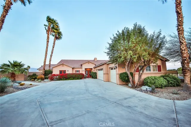 a view of a house with basketball court