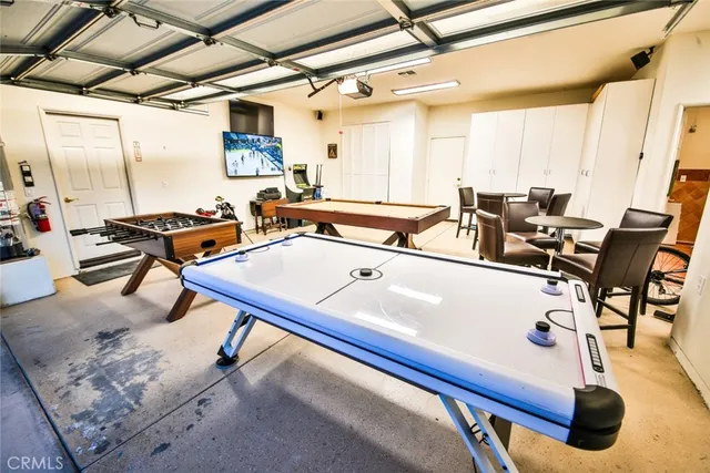 a room with table and chairs