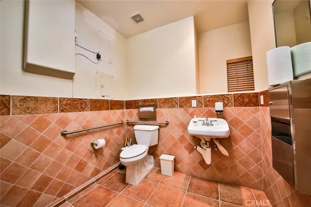 a bathroom with a sink and a toilet