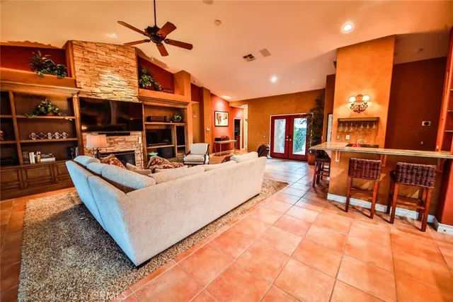 a view of a living room and kitchen