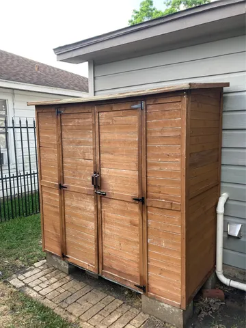 a view of a porch with wooden floor