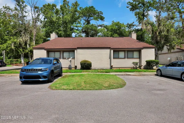 a car parked in front of a house