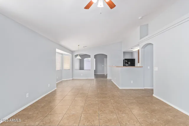 a view of a kitchen with furniture and window