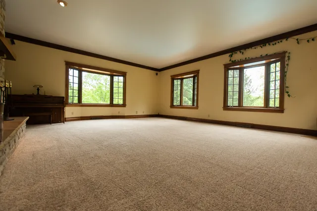 a kitchen with stainless steel appliances a refrigerator sink and cabinets
