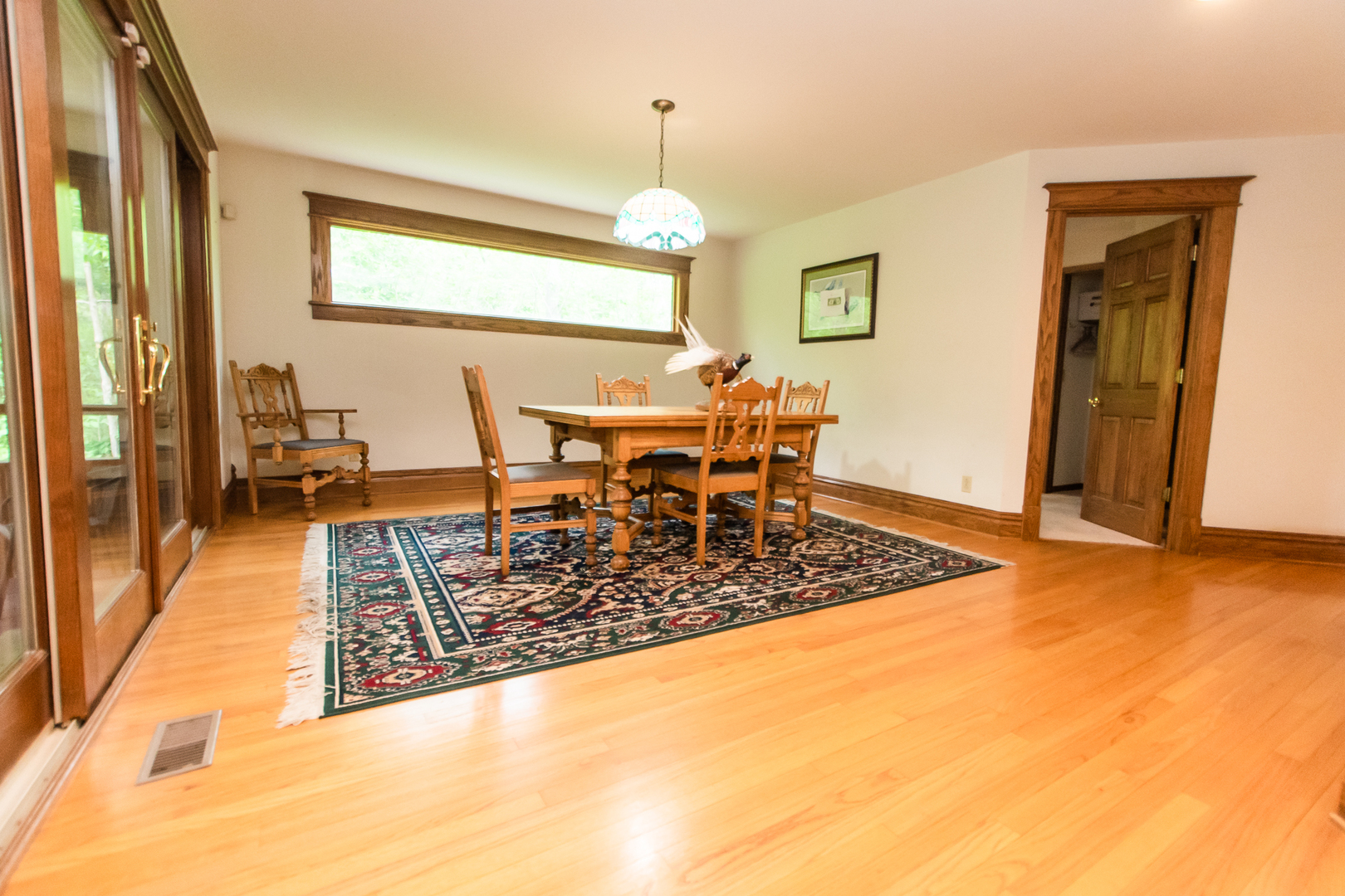 1131 4th Avenue Dixon, IL 61021 - Photo 23 of 82 a view of a dining room with furniture window and wooden floor