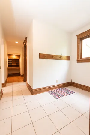 a bedroom with bed and a tv