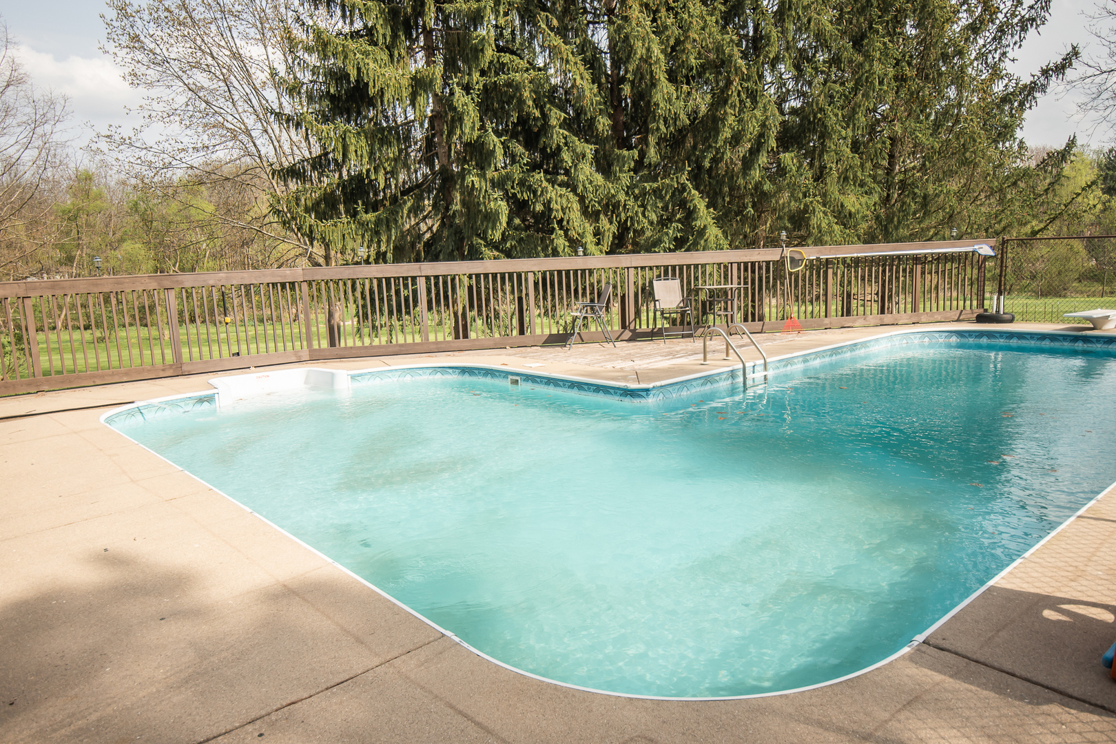 1131 4th Avenue Dixon, IL 61021 - Photo 5 of 82 a view of a swimming pool with a garden