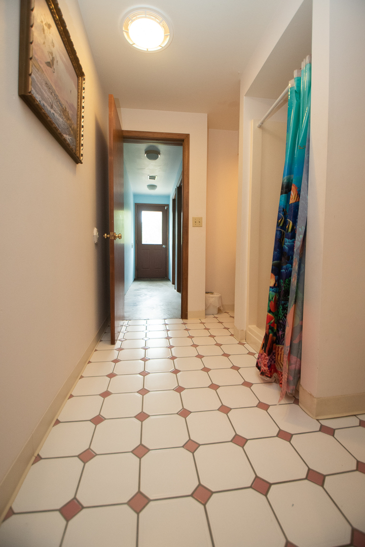 1131 4th Avenue Dixon, IL 61021 - Photo 54 of 82 a view of a livingroom with wooden floor and entryway
