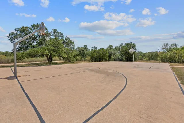 a view of a road with a yard