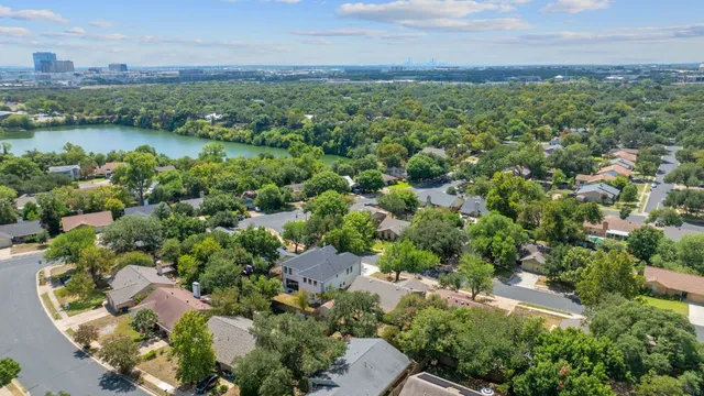 an aerial view of a houses with outdoor space