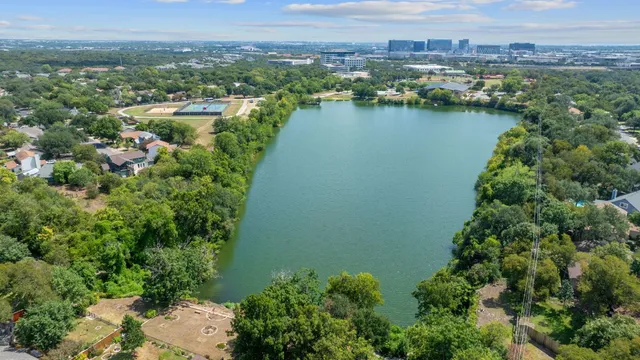 an aerial view of city and lake view