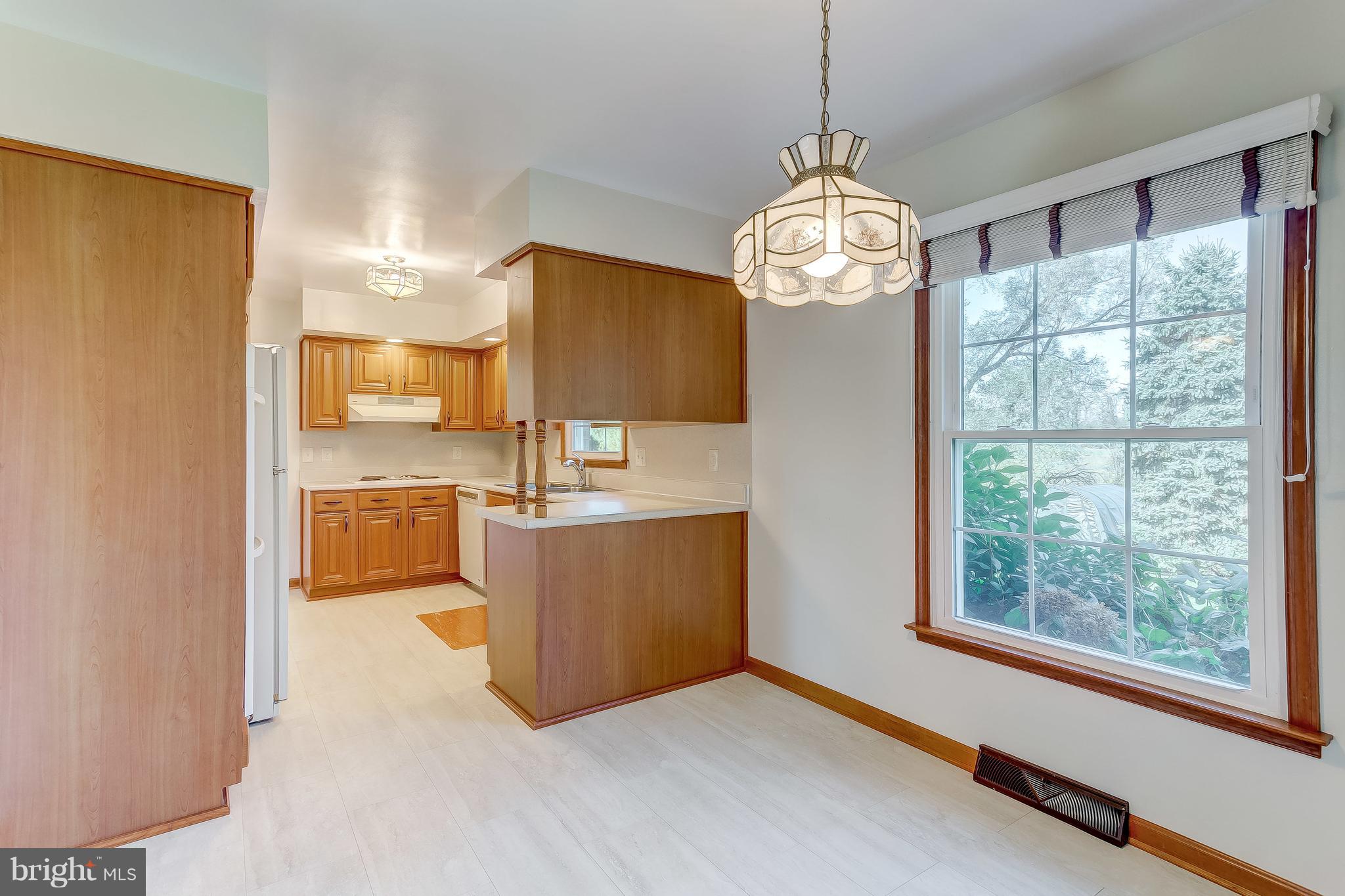 3200 Troyer Road White Hall, MD 21161 - Photo 11 of 36 a view of kitchen with furniture and large window