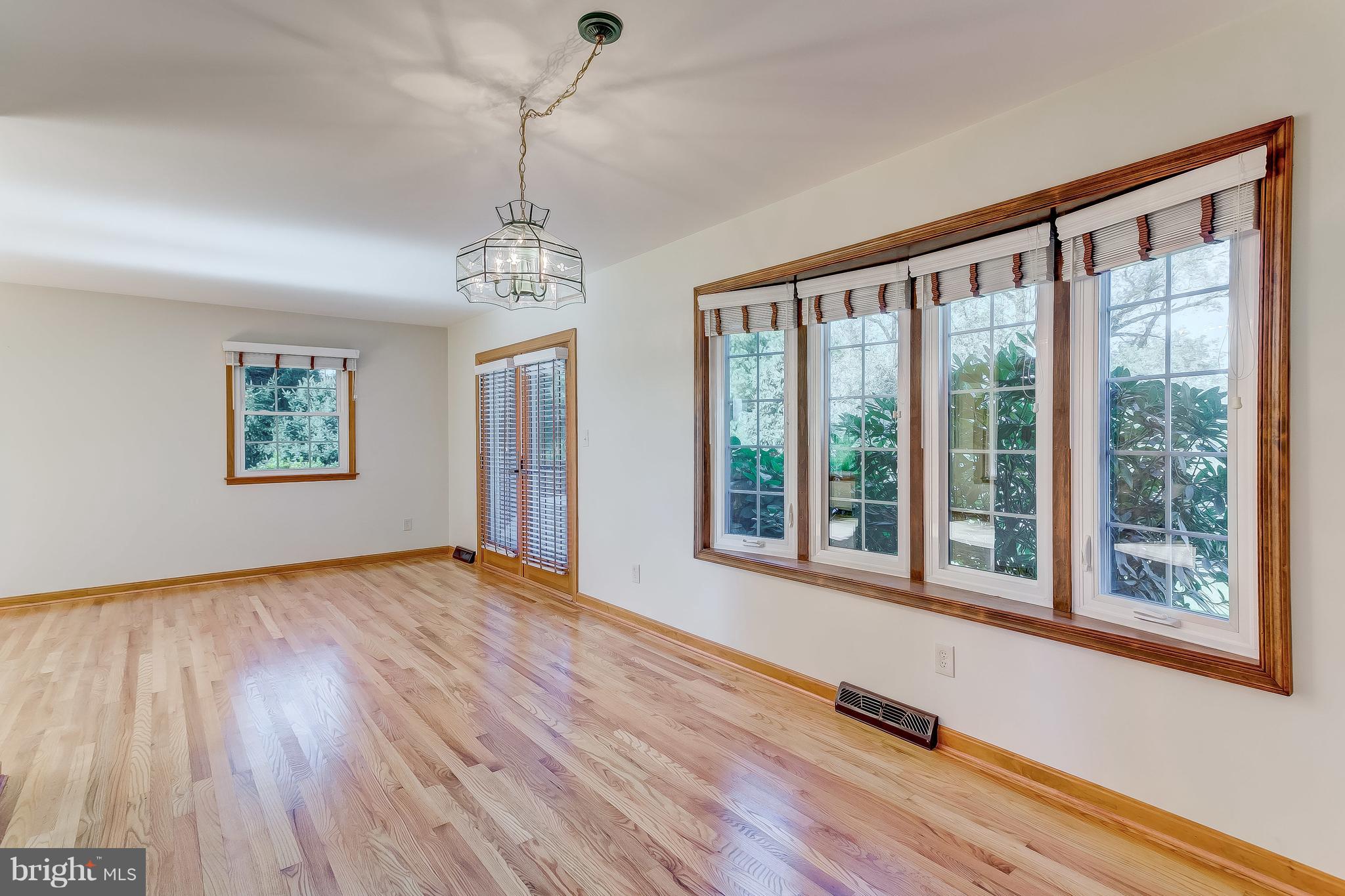 3200 Troyer Road White Hall, MD 21161 - Photo 16 of 36 a view of an empty room with wooden floor and a window