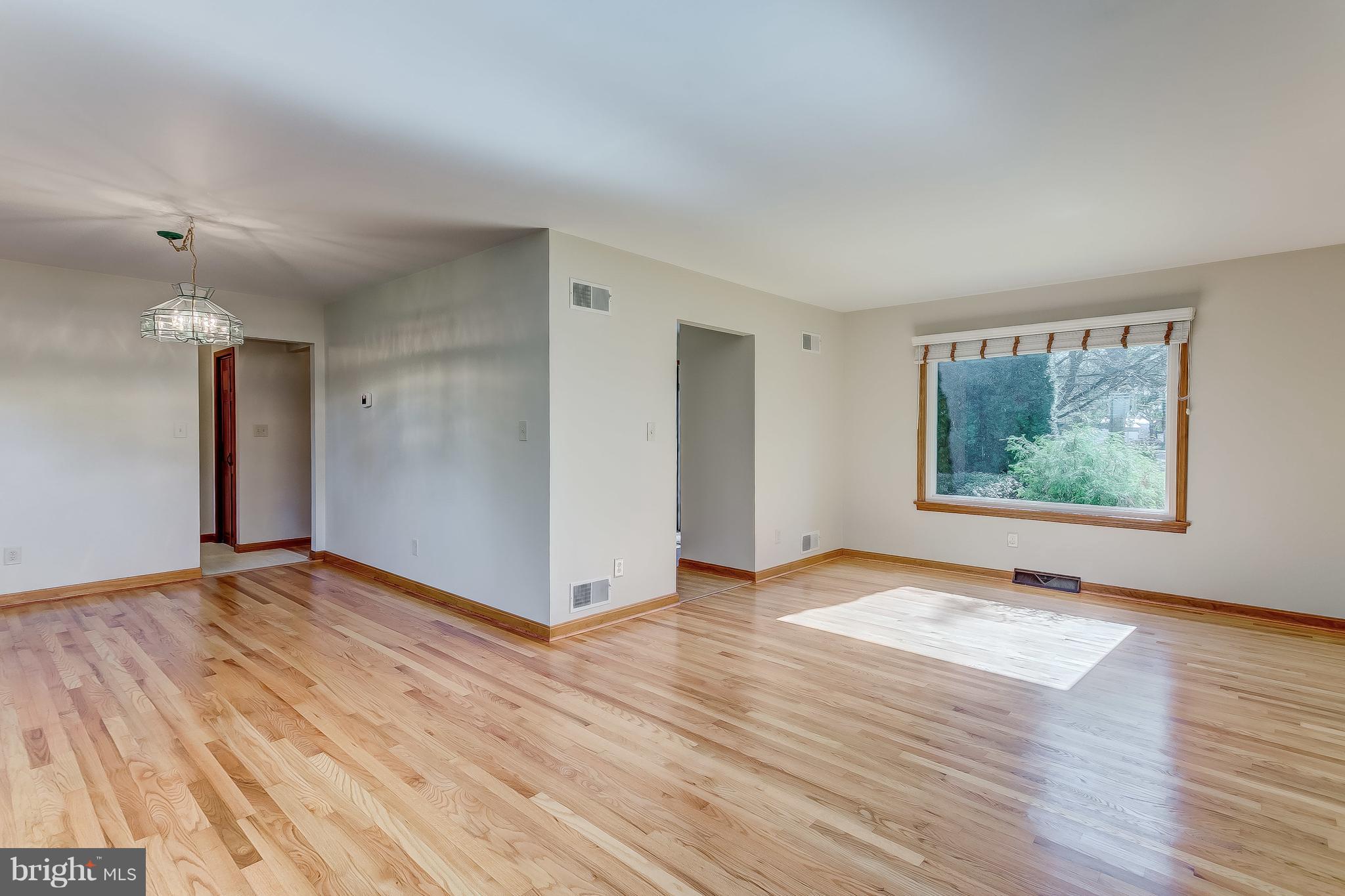 3200 Troyer Road White Hall, MD 21161 - Photo 18 of 36 a view of an empty room with wooden floor and a window