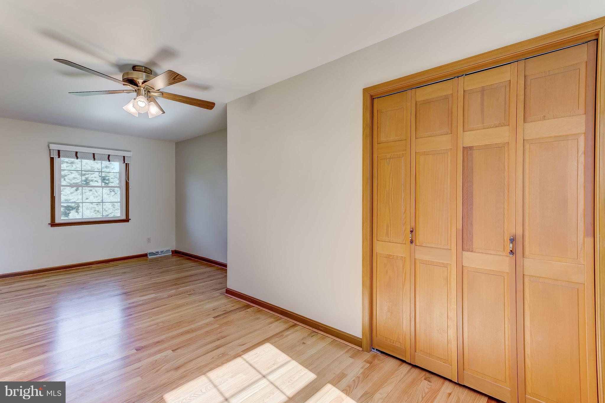 3200 Troyer Road White Hall, MD 21161 - Photo 23 of 36 wooden floor in an empty room with a window