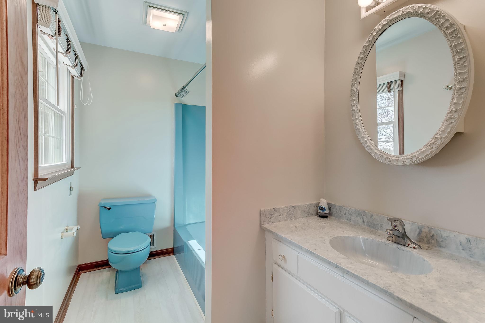 3200 Troyer Road White Hall, MD 21161 - Photo 24 of 36 a bathroom with a toilet sink and mirror