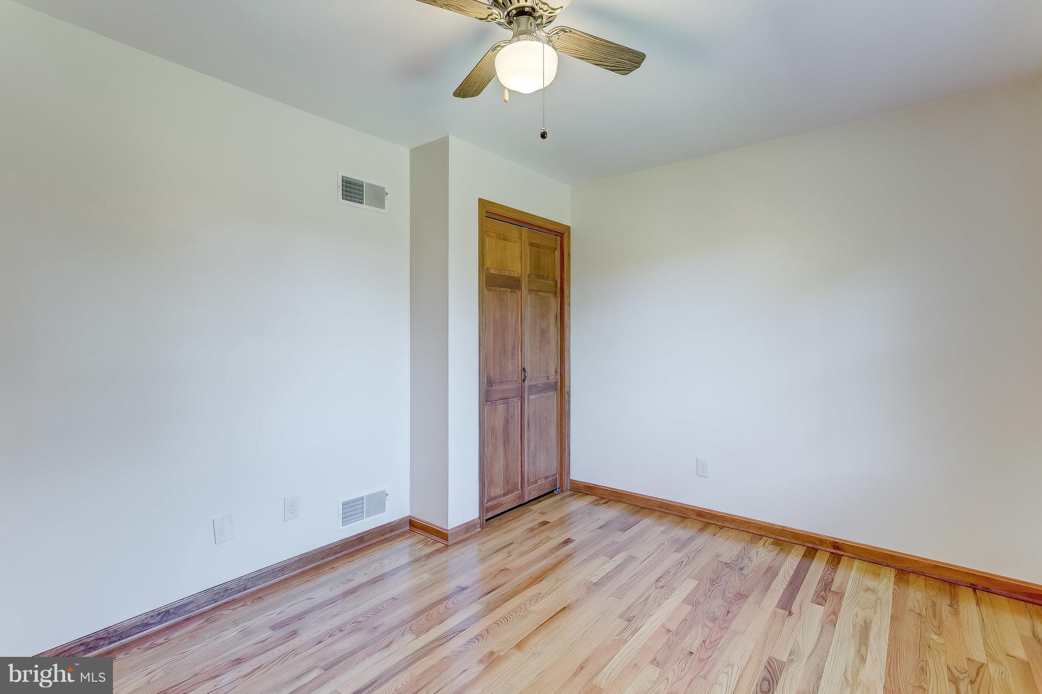 3200 Troyer Road White Hall, MD 21161 - Photo 29 of 36 a view of an empty room with wooden floor and a window