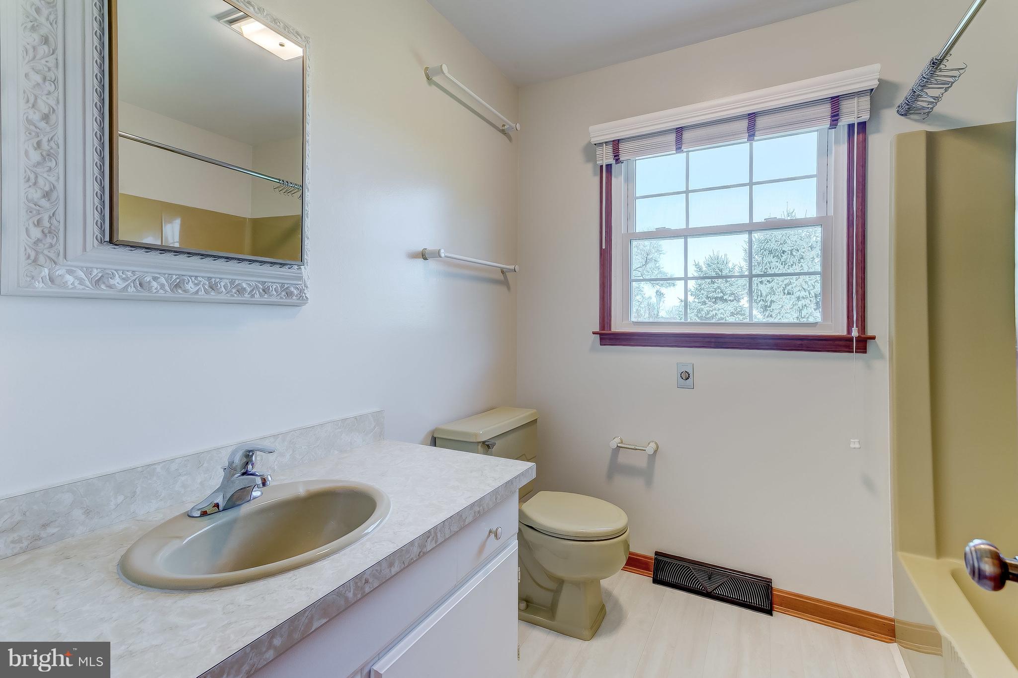 3200 Troyer Road White Hall, MD 21161 - Photo 34 of 36 a bathroom with a sink and a mirror