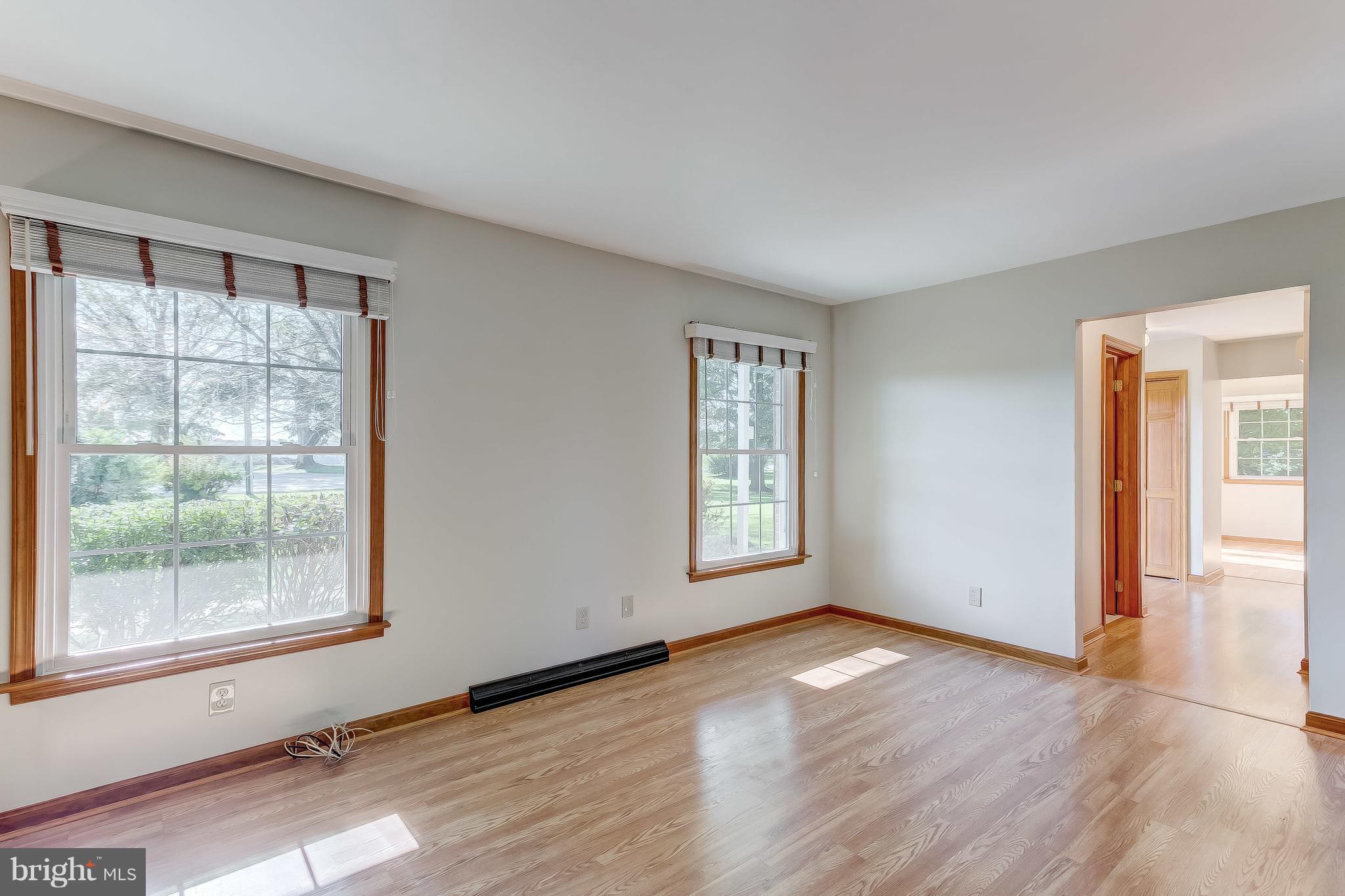 3200 Troyer Road White Hall, MD 21161 - Photo 7 of 36 an empty room with wooden floor and windows