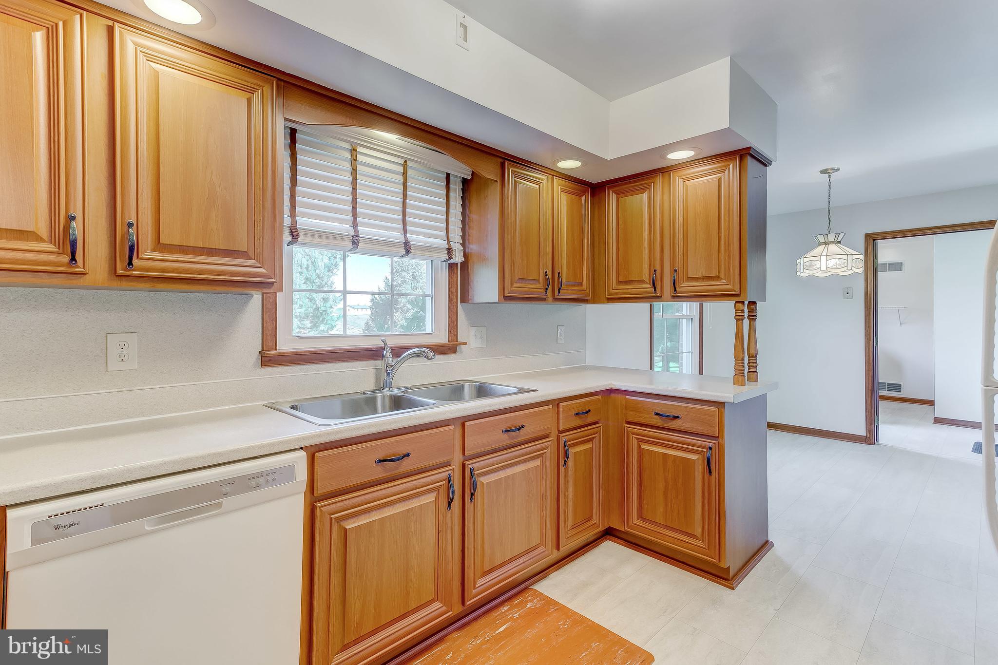 3200 Troyer Road White Hall, MD 21161 - Photo 9 of 36 a kitchen with a sink cabinets and window