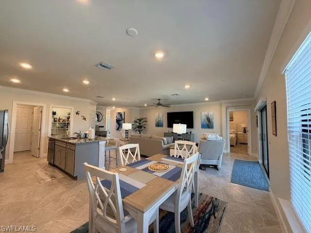 a view of a dining room with furniture
