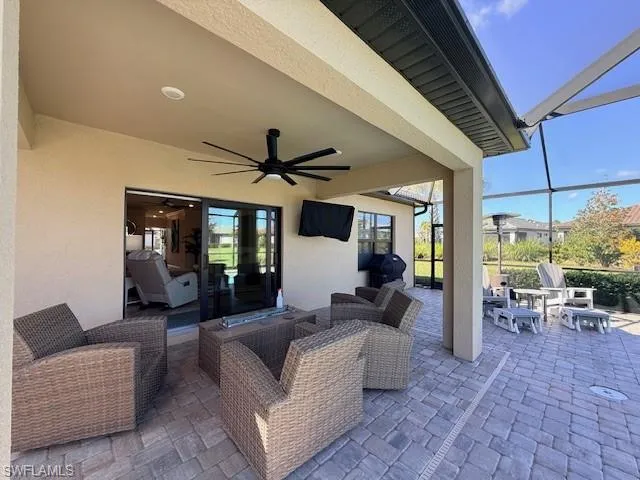 a view of a backyard with sitting area
