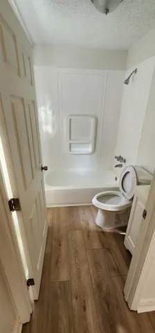 a bathroom with a sink and a toilet