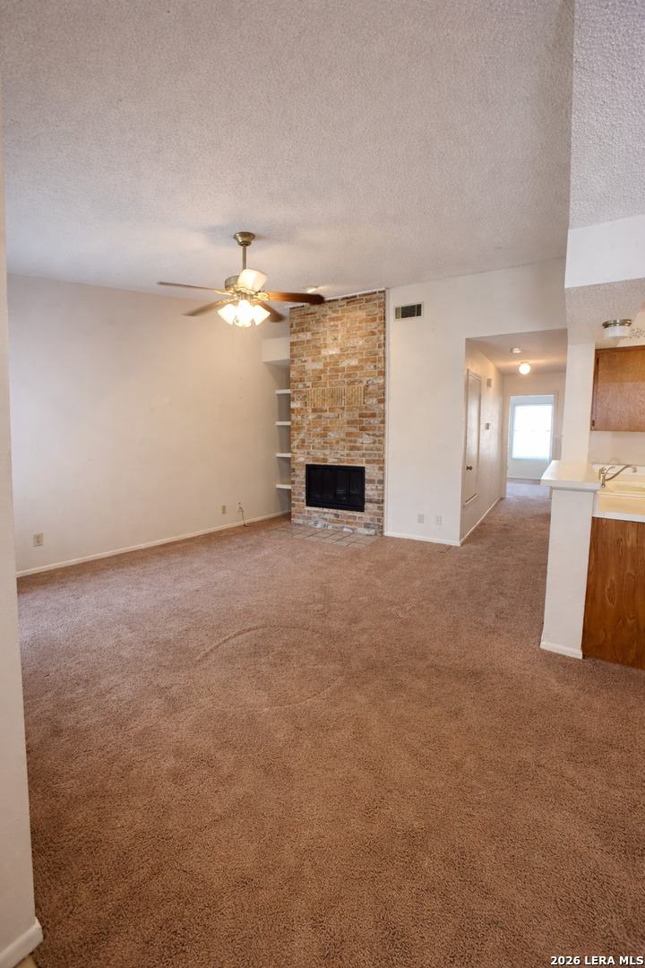 a view of a livingroom with a fireplace