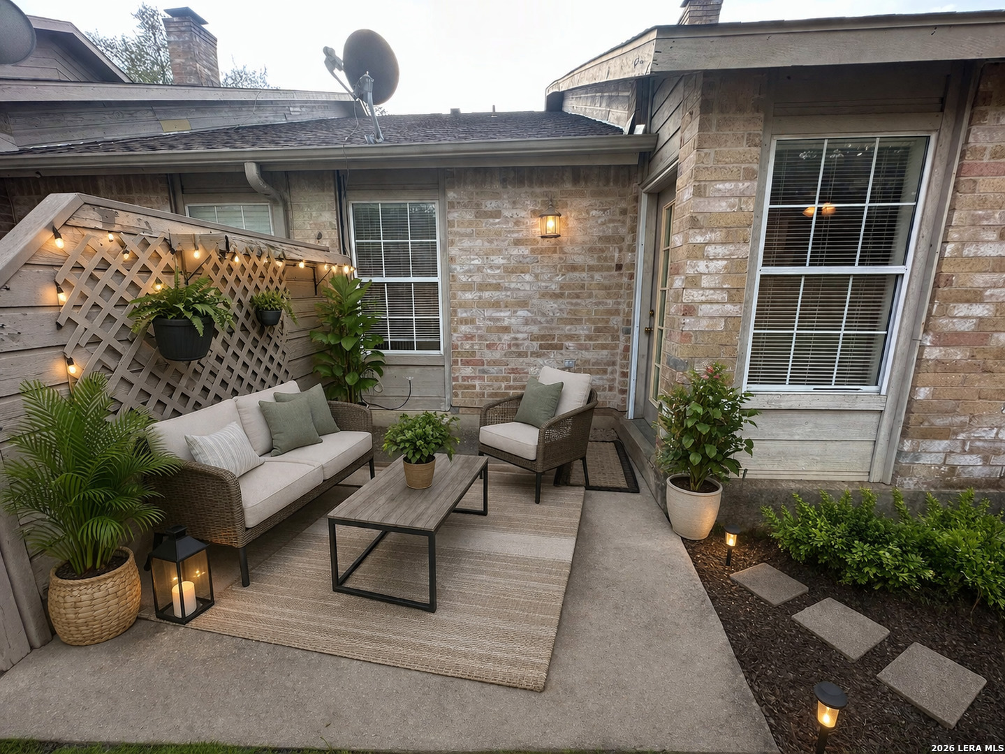 62 Oak Villa Road, Unit F2 Canyon Lake, TX 78133 - Photo 14 of 19 a view of backyard with outdoor seating and plants
