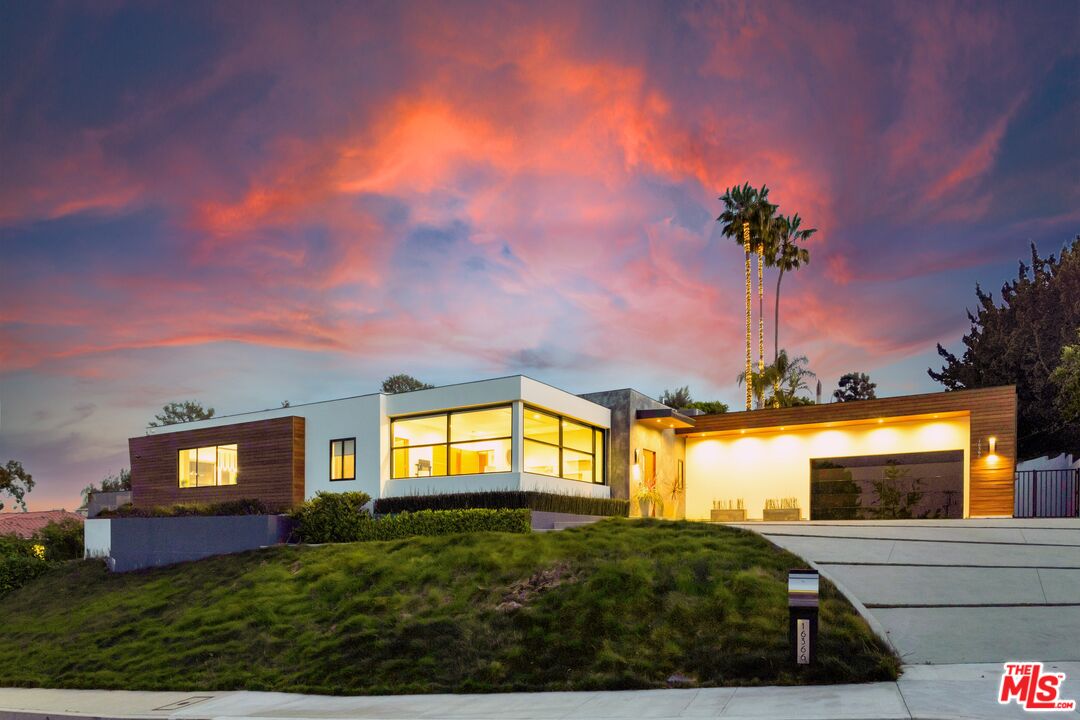 16366 Sloan Drive Los Angeles, CA 90049 - Photo 51 of 54 a house view with a garden space
