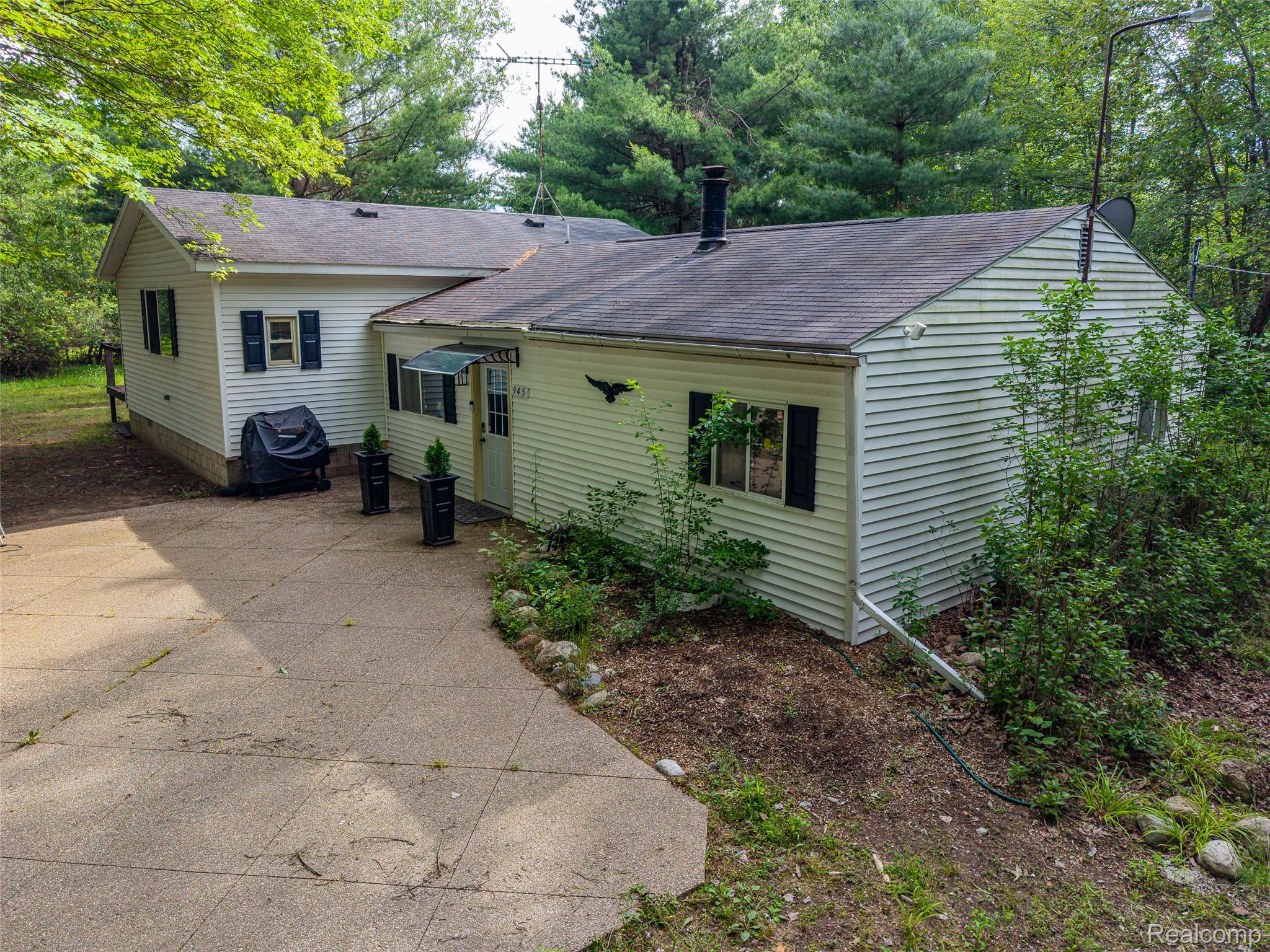 945 North Hockaday Road Gladwin, MI 48624 - Photo 17 of 25 Rear View of Exterior