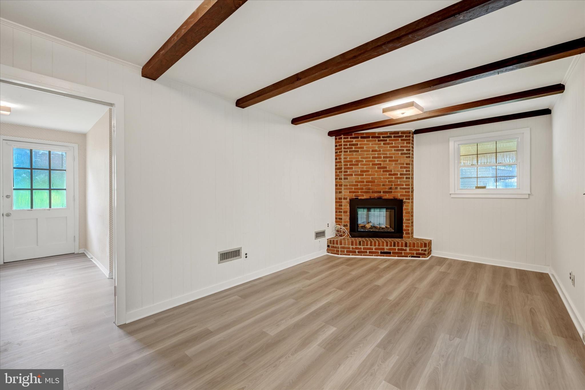 26 Severndale Road Severna Park, MD 21146 - Photo 13 of 35 Freshly painted family room with NEW flooring