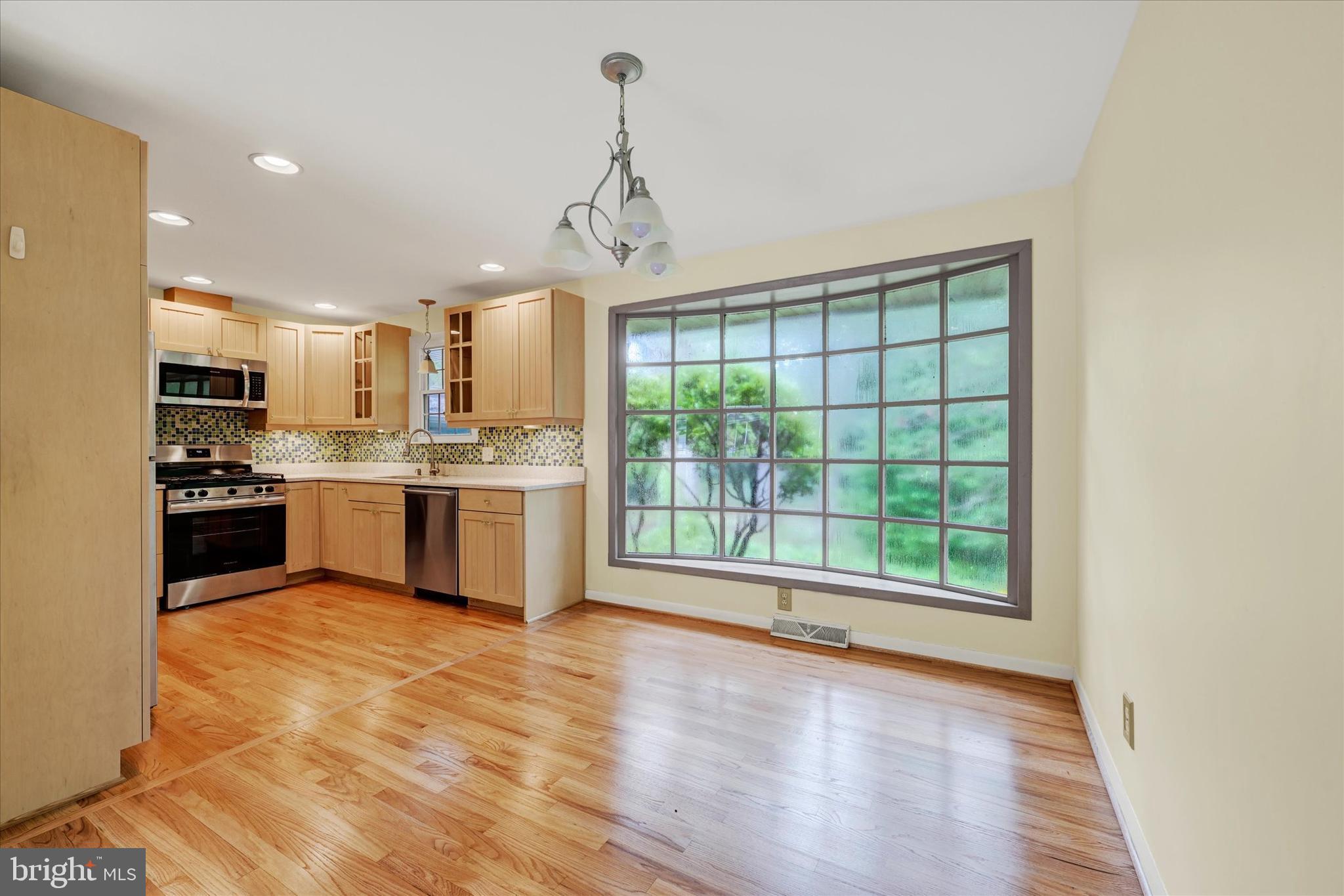26 Severndale Road Severna Park, MD 21146 - Photo 9 of 35 View of kit and dining rm. Note the hardwd floors