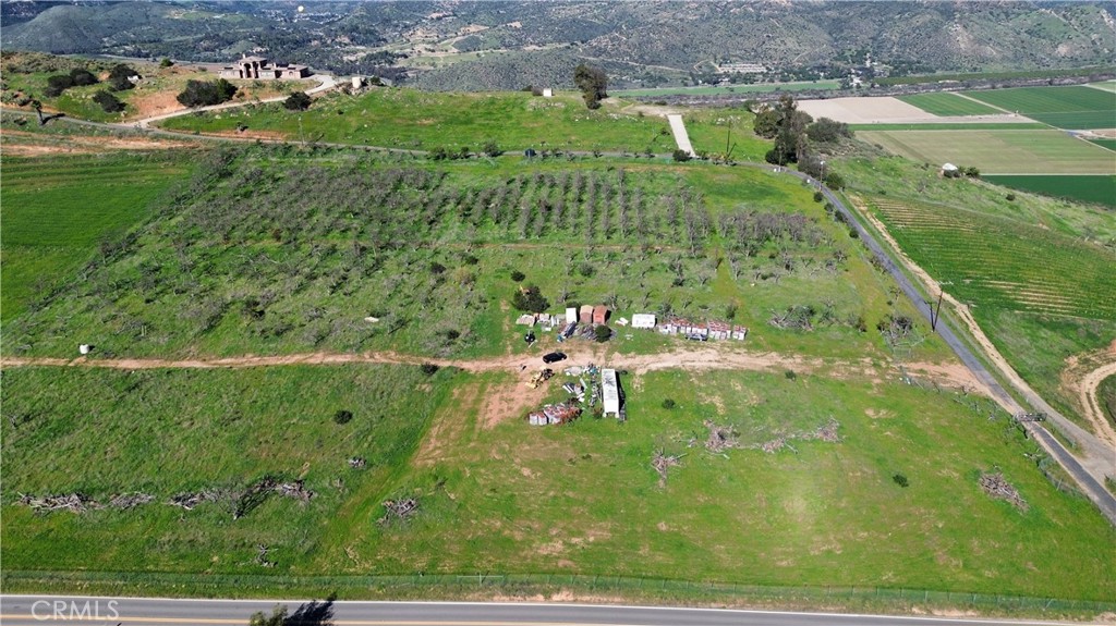 15736 Highland Valley Road Escondido, CA 92025 - Photo 2 of 12 a view of a lush green field
