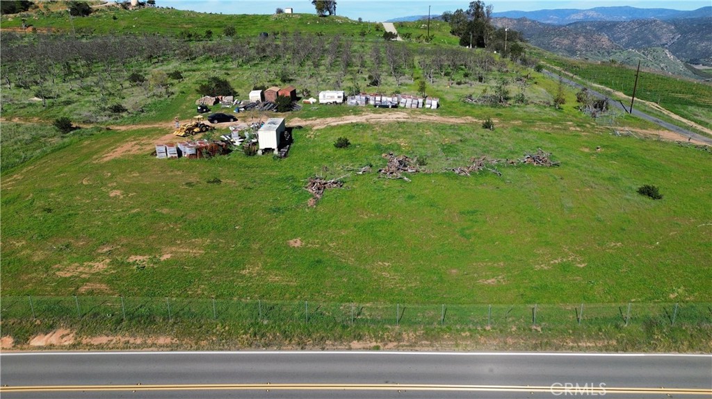 15736 Highland Valley Road Escondido, CA 92025 - Photo 4 of 12 a view of a golf course with car parked