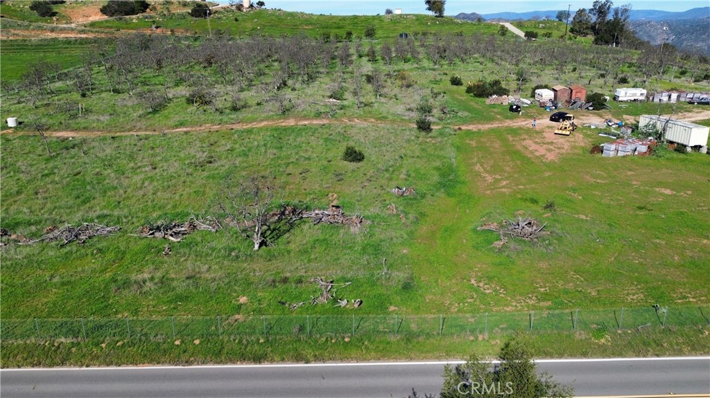 15736 Highland Valley Road Escondido, CA 92025 - Photo 6 of 12 a view of a green field with lots of green space