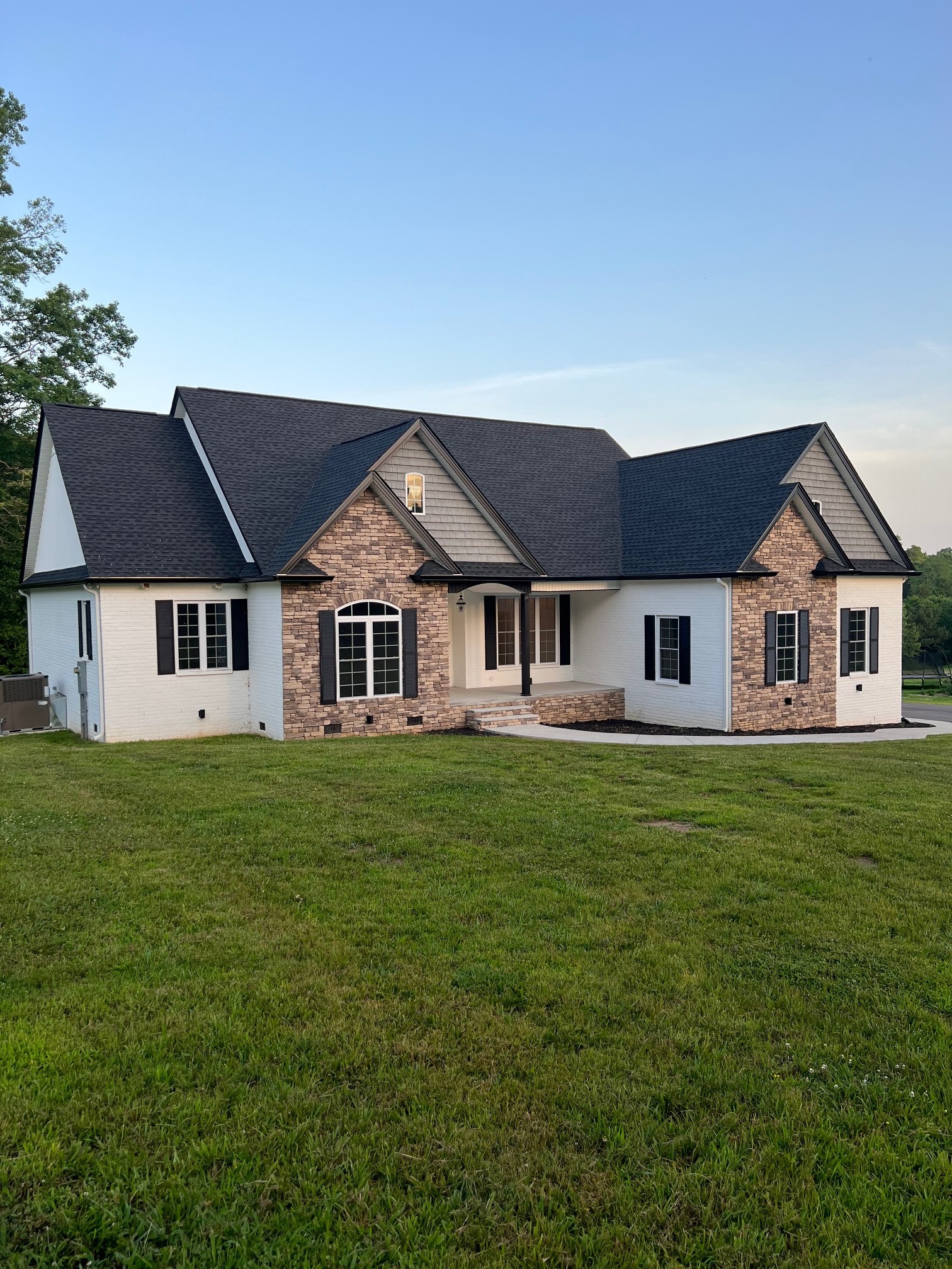 236 Buffalo Road Carthage, TN 37030 - Photo 4 of 55 a front view of a house with a garden