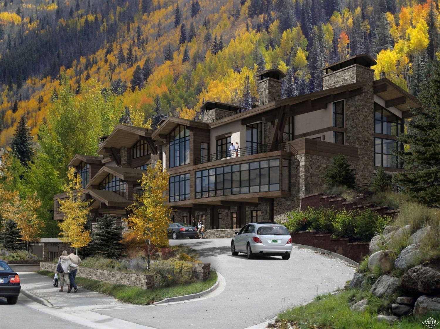 598 Vail Valley Drive, Unit R1 Vail, CO 81657 - Photo 4 of 5 a car parked in front of a house