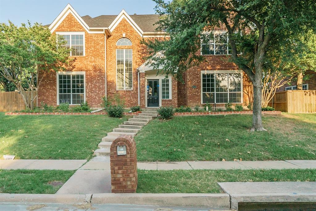 2134 McCoy Road Carrollton, TX 75006 - Photo 1 of 1 front view of a house with a yard